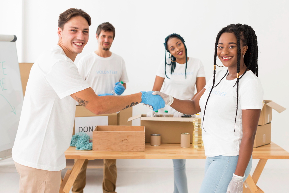 Team packing and loading items from a home